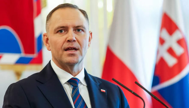 Навроцький підписав закон про звільнення від відповідальності поляків, які воюють на боці України